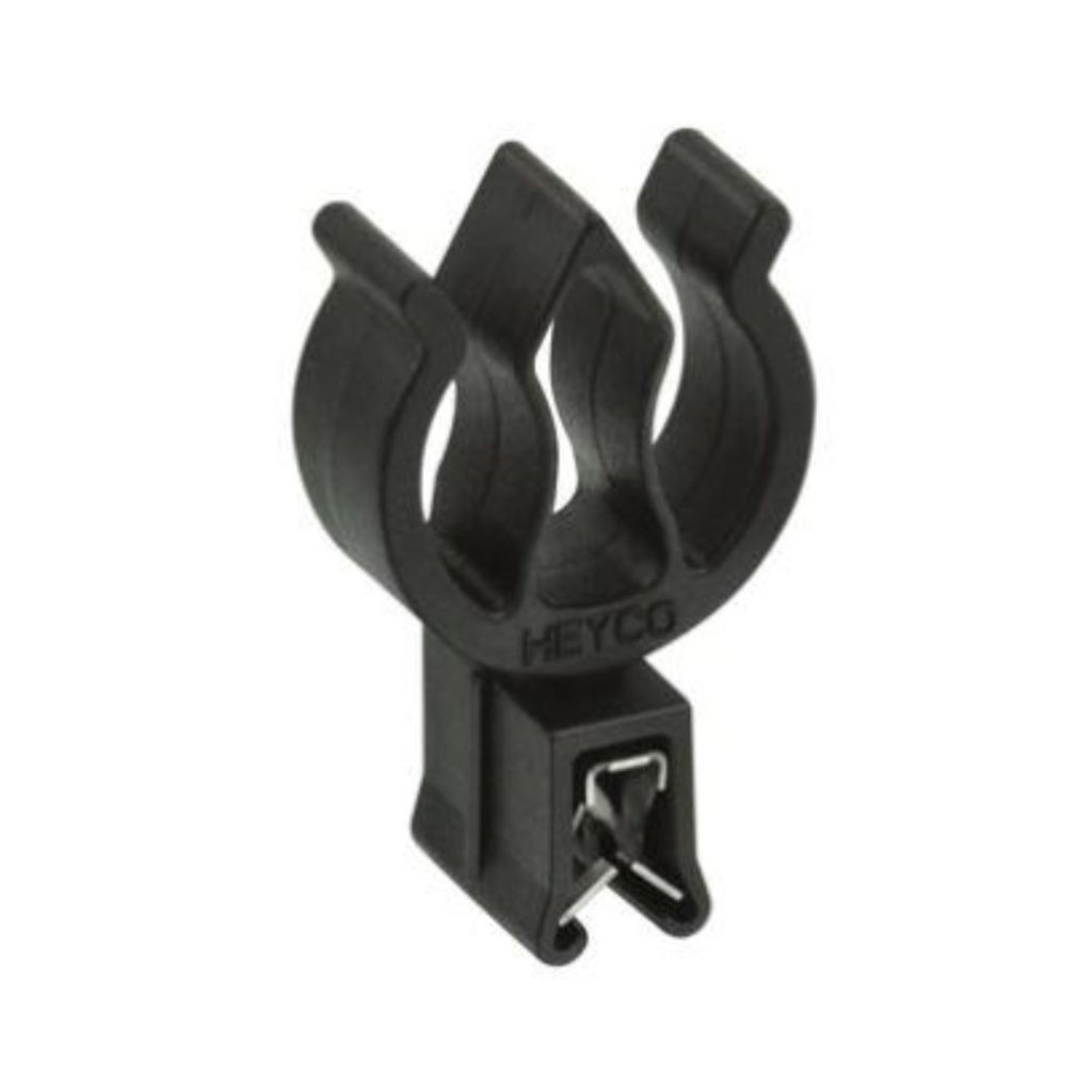 Heyco plastic cord grips used as mechanical components for strain relief and cable sealing in electrical panels and industrial enclosures.